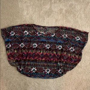 Almost Famous multicolored sheer blouse.